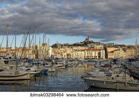 "Sailing yachts, old port and Notre Dame de la Garde, landmark of the city, historic center, Marseille, Departement Bouches-du-Rhone, Region Provence-Alpes-Cote d’Azur d’Azur, France, Europe" View Large Photo Image Picture - "Sailing yachts, old port and Notre Dame de la Garde, landmark of the city, historic center, Marseille, Departement Bouches-du-Rhone, Region Provence-Alpes-Cote d’Azur d’Azur, France, Europe". Fotosearch