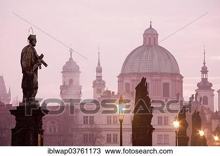 Stock Image - "Saint figures, Charles Bridge, Church of St. Francis Seraph, Prague, Czech Republic, Europe". Fotosearch