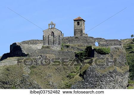 Stock Image - "Saint Ilpize castle and the chapel, Saint Ilpize, Haute-Loire department, Auvergne, France, Europe". Fotosearch