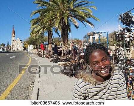 "Saleswoman at the souvenir market, Evangelical Lutheran Church of Christ at the rear, Windhoek, Namibia, Africa" View Large Photo Image Stock Photography - "Saleswoman at the souvenir market, Evangelical Lutheran Church of Christ at the rear, Windhoek, Namibia, Africa". Fotosearch