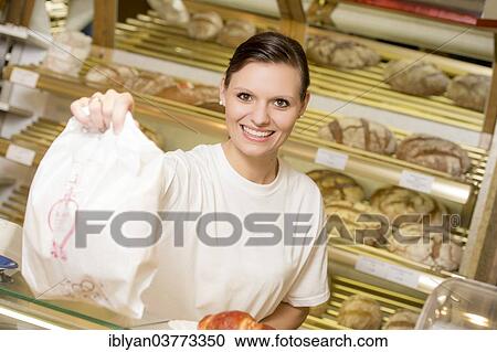 "Saleswoman in a bakery, Austria, Europe" View Large Photo Image Stock Image - "Saleswoman in a bakery, Austria, Europe". Fotosearch