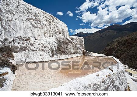 Stock Image - "Salinas de Maras salt pans, created by the Incas and still in operation, Pichingote, Cusco region, Andes, Peru, South America". Fotosearch