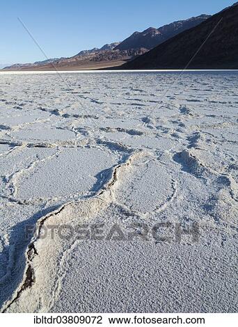 "Salt crusts at the Badwater Basin, salt flats in the Death Valley, lowest point in North America, Death Valley National Park, California, USA" View Large Photo Image Stock Image - "Salt crusts at the Badwater Basin, salt flats in the Death Valley, lowest point in North America, Death Valley National Park, California, USA". Fotosearch