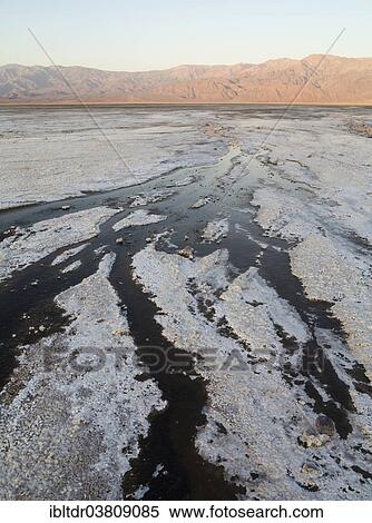"Salt marshes in the morning, Panamint Range in the back, central Death Valley, Death Valley National Park, California, USA" View Large Photo Image Stock Photography - "Salt marshes in the morning, Panamint Range in the back, central Death Valley, Death Valley National Park, California, USA". Fotosearch