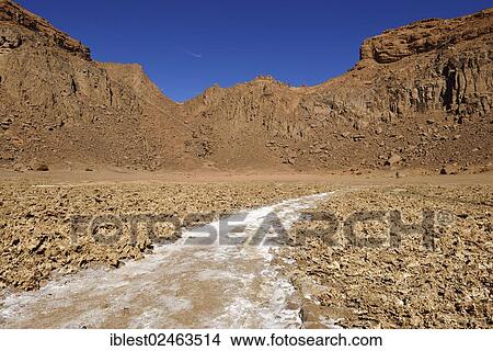 "Salt pan in the volcanic landscape of the lower Ouksem Crater, Sahara, Menzas, Tamanrasset Province, Algeria, Africa" View Large Photo Image Picture - "Salt pan in the volcanic landscape of the lower Ouksem Crater, Sahara, Menzas, Tamanrasset Province, Algeria, Africa". Fotosearch