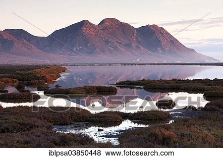 "Salt pans in the last evening light, Almadraba de Monteleva, Cabo de Gata-Nijar Natural Park, biosphere reserve, Almeria province, Andalusia, Spain, Europe" View Large Photo Image Stock Photo - "Salt pans in the last evening light, Almadraba de Monteleva, Cabo de Gata-Nijar Natural Park, biosphere reserve, Almeria province, Andalusia, Spain, Europe". Fotosearch