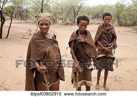 Stock Photography - "San or Bushmen women in traditional dress, Ghanzi, Botswana, Africa". Fotosearch
