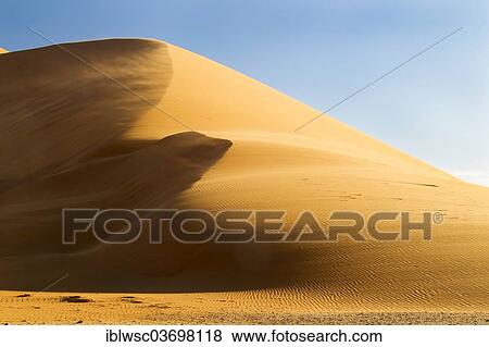 Stock Photo - "Sand dune in the evening light, Sossusvlei, Namib Desert, Namib Naukluft Park, Namibia, Africa". Fotosearch