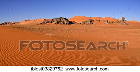 "Sand dunes and rocks at Tin Merzouga, Tadrart region, Tassili n'Ajjer National Park, Unesco World Heritage Site, Algeria, Sahara, Africa" View Large Photo Image Stock Image - "Sand dunes and rocks at Tin Merzouga, Tadrart region, Tassili n'Ajjer National Park, Unesco World Heritage Site, Algeria, Sahara, Africa". Fotosearch