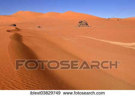 Stock Photo - "Sand dunes and rocks at Tin Merzouga, Tadrart region, Tassili n'Ajjer National Park, Unesco World Heritage Site, Algeria, Sahara, Africa". Fotosearch