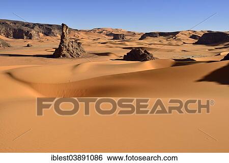"Sand dunes and rocks of Moul Naga, Tadrart, Tassili n'Ajjer National Park, Unesco World Heritage Site, Sahara, Algeria, Africa" View Large Photo Image Stock Photograph - "Sand dunes and rocks of Moul Naga, Tadrart, Tassili n'Ajjer National Park, Unesco World Heritage Site, Sahara, Algeria, Africa". Fotosearch