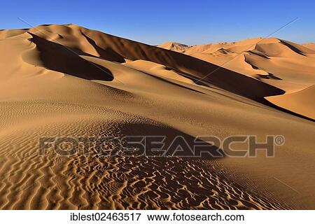 "Sand dunes at Erg Mehejibad, Erg Mehejibad, Immidir or Mouydir, Sahara, Tamanrasset Province, Algeria, Africa" View Large Photo Image Stock Photo - "Sand dunes at Erg Mehejibad, Erg Mehejibad, Immidir or Mouydir, Sahara, Tamanrasset Province, Algeria, Africa". Fotosearch