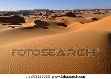 "Sand dunes of In Tehak, Tadrart, Tassili n'Ajjer National Park, Unesco World Heritage Site, Sahara, Algeria, Africa" View Large Photo Image Stock Image - "Sand dunes of In Tehak, Tadrart, Tassili n'Ajjer National Park, Unesco World Heritage Site, Sahara, Algeria, Africa". Fotosearch