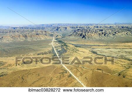"Sand road C26, disappearing between the mountains in the direction of Gamsberg Pass, Khomas Hochland, Namibia, Africa" View Large Photo Image Stock Image - "Sand road C26, disappearing between the mountains in the direction of Gamsberg Pass, Khomas Hochland, Namibia, Africa". Fotosearch