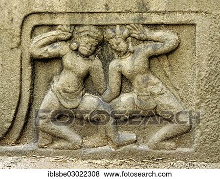 Stock Photo - "Sandstone relief, wrestlers, Khueng My style, 10th century, Cham Museum, Da Nang, Zentralvietnam, Vietnam, Asia". Fotosearch