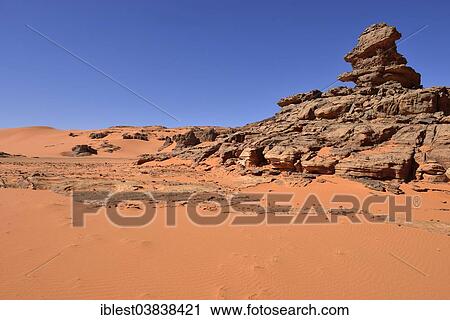 "Sandstone rock towers and sand dunes at Tin Merzouga, Tadrart region, Tassili n'Ajjer National Park, Unesco World Heritage Site, Algeria, Sahara, North Africa, Africa" View Large Photo Image Stock Image - "Sandstone rock towers and sand dunes at Tin Merzouga, Tadrart region, Tassili n'Ajjer National Park, Unesco World Heritage Site, Algeria, Sahara, North Africa, Africa". Fotosearch
