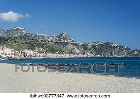 Stock Photo - "Sandy beach in a bay, Giardini Naxos, Sicily, Italy, Europe". Fotosearch