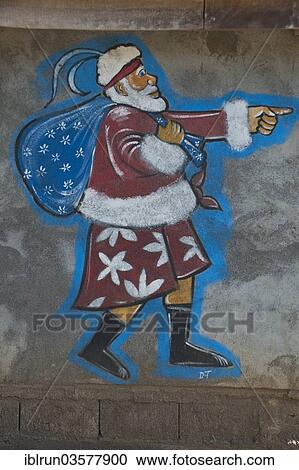 Stock Image - "Santa Claus painted on a wall, Tanna, Vanuatu, Oceania". Fotosearch
