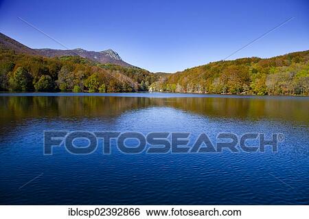 "Santa Fe Lake in autumn, surrounded by a deciduous forest, Montseny, Catalonia, Spain, Europe" View Large Photo Image Stock Photograph - "Santa Fe Lake in autumn, surrounded by a deciduous forest, Montseny, Catalonia, Spain, Europe". Fotosearch