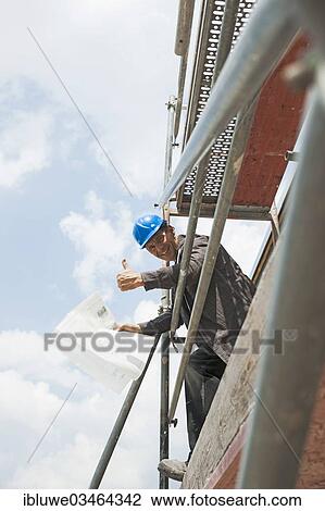 "Satisfied construction manager making a thumbs-up gesture, Mannheim, Baden-Wurttemberg, Germany, Europe" View Large Photo Image Stock Image - "Satisfied construction manager making a thumbs-up gesture, Mannheim, Baden-Wurttemberg, Germany, Europe". Fotosearch
