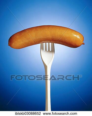 Sausage on a plastic fork View Large Photo Image Stock Image - Sausage on a plastic fork. Fotosearch