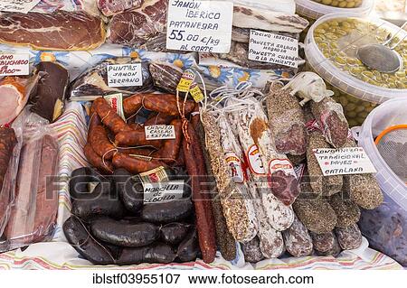 "Sausages and ham, weekly market market in Porto Colom, Majorca, Balearic Islands, Spain, Europe" View Large Photo Image Stock Photo - "Sausages and ham, weekly market market in Porto Colom, Majorca, Balearic Islands, Spain, Europe". Fotosearch