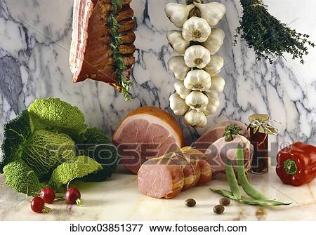 Stock Photo - Sausages and vegetables. Fotosearch