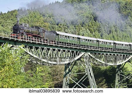 Stock Photo - "Sauschwanzlebahn train on the Biesenbach Viaduct, near Blumberg, Black Forest, Baden-Wurttemberg, Germany, Europe". Fotosearch