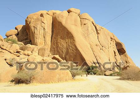 Savannah landscape with granite rocks of the Pontok Mountains, Spitzkoppe Mountain, Grosse Spitzkuppe Nature Reserve, Namibia, Africa View Large Photo Image Stock Photography - Savannah landscape with granite rocks of the Pontok Mountains, Spitzkoppe Mountain, Grosse Spitzkuppe Nature Reserve, Namibia, Africa. Fotosearch