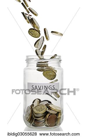 "Savings jar with coins pouring into it, UK currency" View Large Photo Image Stock Photo - "Savings jar with coins pouring into it, UK currency". Fotosearch