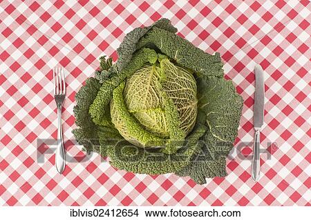 Savoy cabbage with knife and fork View Large Photo Image Picture - Savoy cabbage with knife and fork. Fotosearch