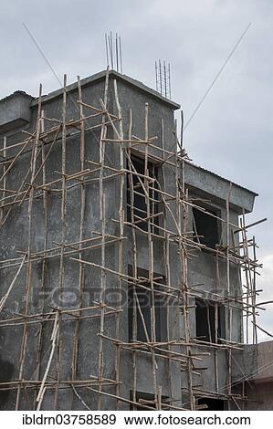 Stock Photo - "Scaffolding on a construction site, Freetown, Western Area, Sierra Leone, Africa". Fotosearch