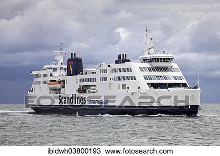 "Scandlines ferry, Vogelfluglinie transport corridor, dark clouds, Fehmarn Island, Schleswig-Holstein, Germany, Europe" View Large Photo Image Stock Image - "Scandlines ferry, Vogelfluglinie transport corridor, dark clouds, Fehmarn Island, Schleswig-Holstein, Germany, Europe". Fotosearch