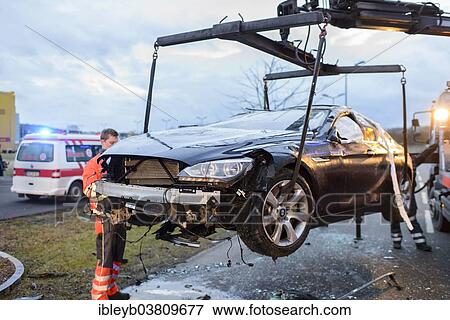 "Scene of an accident, BMW sports car being recovered by a breakdown lorry, Germany, Europe" View Large Photo Image Stock Photo - "Scene of an accident, BMW sports car being recovered by a breakdown lorry, Germany, Europe". Fotosearch