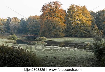 Stock Image - "Schlangensee lake with a bridge, Branitzer Park, Cottbus, Brandenburg, Germany, Europe". Fotosearch