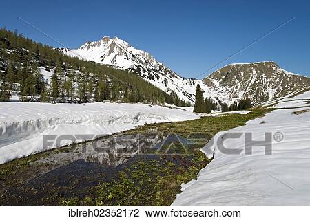 Stock Image - "Schleimssattel mountain, Mondscheinspitze mountain at the back, Karwendel Mountains, Tyrol, Austria, Europe". Fotosearch