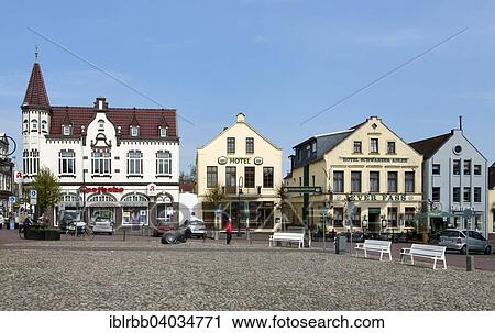 Stock Image - "Schloss-Apotheke pharmacy and commercialmbuildings, Alter Markt, Jever, Frisia, Lower Saxony, Germany, Europe". Fotosearch