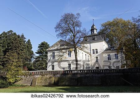 Stock Image - "Schloss Eller castle, with the tower of the old moated castle, Dusseldorf, North Rhine-Westphalia, Germany, Europe". Fotosearch