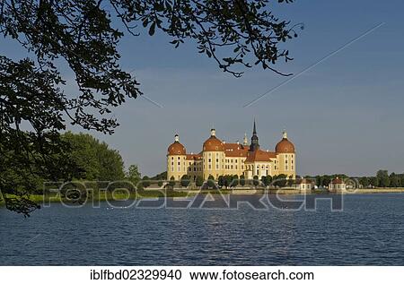 Stock Image - "Schloss Moritzburg"""", a former castle to celebrate hunting, is situated 10 km out of the City Dresden in the middle of beautiful forrests and lakes. Moritzburg, Germany, Europe". Fotosearch