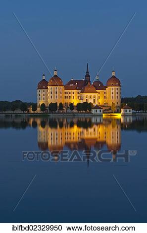 "Schloss Moritzburg"""" at night, a former castle to celebrate hunting, situated 10 km out of the City Dresden in the middle of beautiful forrests and lakes. Moritzburg, Germany, Europe" View Large Photo Image Stock Image - "Schloss Moritzburg"""" at night, a former castle to celebrate hunting, situated 10 km out of the City Dresden in the middle of beautiful forrests and lakes. Moritzburg, Germany, Europe". Fotosearch