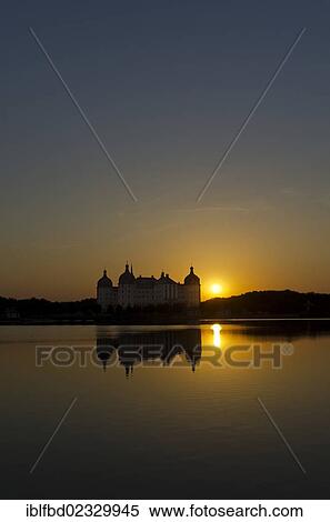 "Schloss Moritzburg"""" at sunset, a former castle to celebrate hunting, situated 10 km out of the City Dresden in the middle of beautiful forrests and lakes. Moritzburg, Germany, Europe" View Large Photo Image Stock Photography - "Schloss Moritzburg"""" at sunset, a former castle to celebrate hunting, situated 10 km out of the City Dresden in the middle of beautiful forrests and lakes. Moritzburg, Germany, Europe". Fotosearch