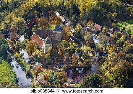 Stock Photo - "Schloss Rheda Castle, Schlosspark Rheda Castle Gardens, red murky moat, Ems River, aerial view of Rheda-Wiedenbruck, Gutersloh district, Rheda, Rheda-Wiedenbruck, North Rhine-Westphalia, Germany, Europe". Fotosearch