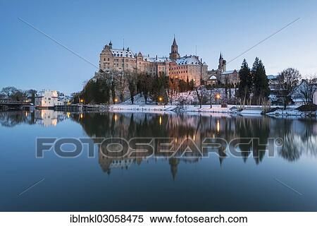 Stock Photography - "Schloss Sigmaringen castle on the Danube River at the blue hour, Sigmaringen, Landkreis Sigmaringen, Baden-Wurttemberg, Germany, Europe". Fotosearch