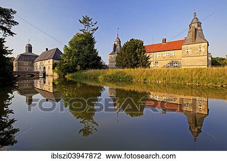 Stock Image - "Schloss Westerwinkel, moated castle, Ascheberg, Munsterland, North Rhine-Westphalia, Germany, Europe". Fotosearch