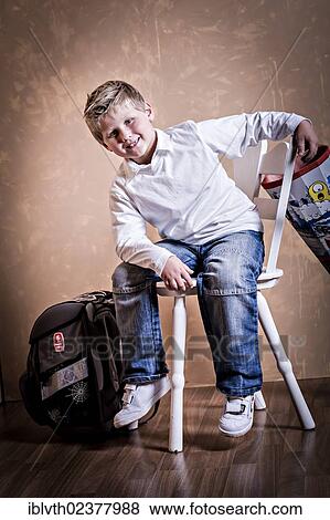 "School boy, first grader with a school bag" View Large Photo Image Stock Photo - "School boy, first grader with a school bag". Fotosearch