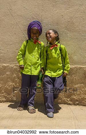 Stock Image - "School girls wearing school uniforms, Asmara, Eritrea, Africa". Fotosearch