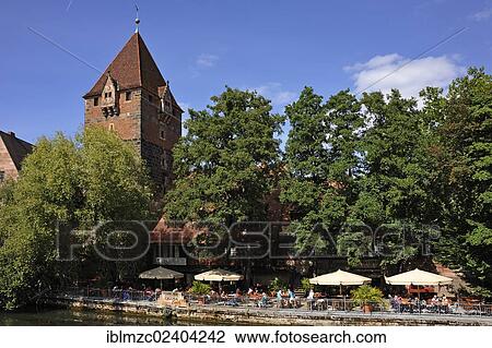 "Schuldturm tower, a former debtors' prison, built in 1323 on the bank of the Pegnitz river, beer garden, Insel Schuett 2, Nuremberg, Middle Franconia, Bavaria, Germany, Europe, PublicGround, Europe" View Large Photo Image Stock Image - "Schuldturm tower, a former debtors' prison, built in 1323 on the bank of the Pegnitz river, beer garden, Insel Schuett 2, Nuremberg, Middle Franconia, Bavaria, Germany, Europe, PublicGround, Europe". Fotosearch