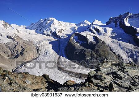 "Schwarze Mountain between Zwillingsgletscher and Schwarzegletscher glaciers, Gornergrat Ridge, Zermatt, Canton of Valais, Switzerland, Europe" View Large Photo Image Stock Photo - "Schwarze Mountain between Zwillingsgletscher and Schwarzegletscher glaciers, Gornergrat Ridge, Zermatt, Canton of Valais, Switzerland, Europe". Fotosearch
