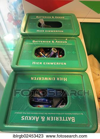 Stock Image - "Scrap battery collection station in a department store, Germany, Europe". Fotosearch