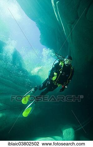 "Scuba diver in the Verzasca River, Lavertezzo, Valle Verzasca, Canton Ticino, Switzerland, Europe" View Large Photo Image Stock Image - "Scuba diver in the Verzasca River, Lavertezzo, Valle Verzasca, Canton Ticino, Switzerland, Europe". Fotosearch